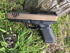 We stripped this glock down and ported the slide and coated in Burnt Bronze